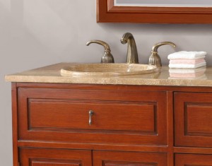 A beautiful granite countertop with recessed vessel sink