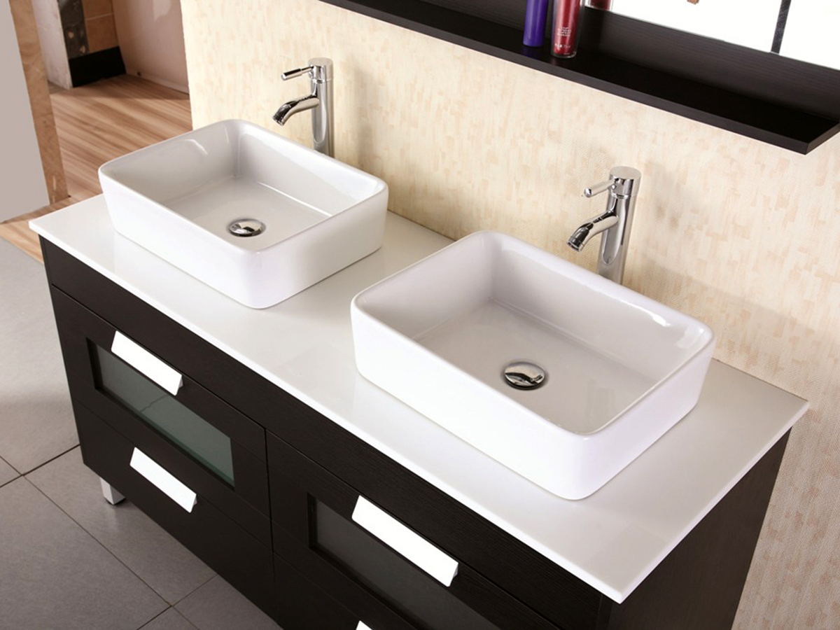 Composite stone top with porcelain vessel sinks Composite stone top with porcelain vessel sinks
