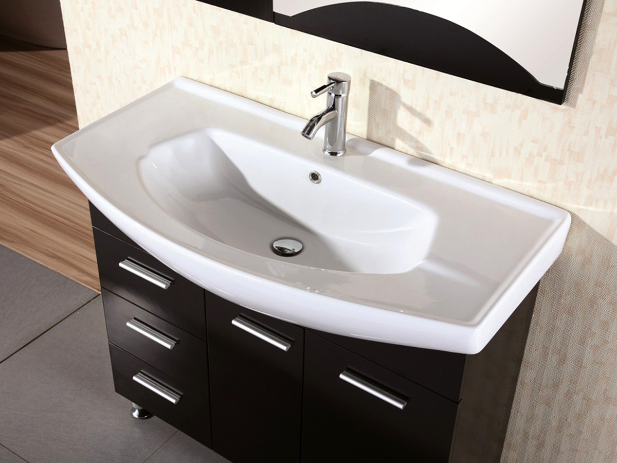 Porcelain integrated sink top